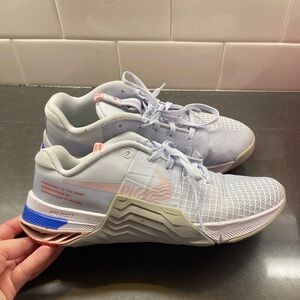 Nike Light Gray Athletic Training Shoes with Pastel Pink & Blue Accents